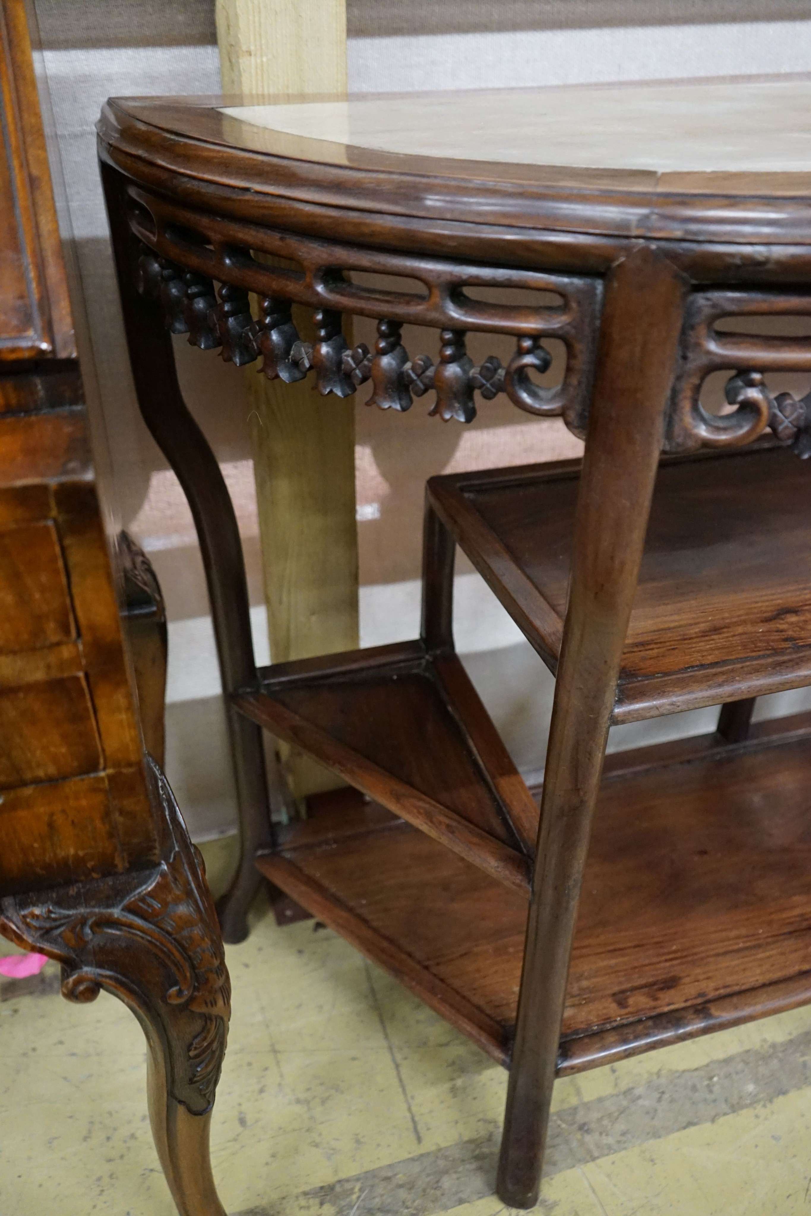 A pair of Chinese marble-topped demi lune console tables, width 82cm, depth 40cm, height 80cm